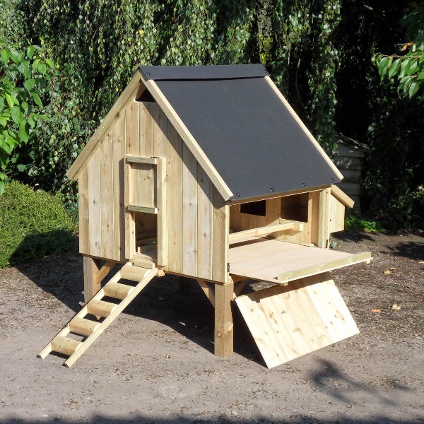 A chicken house with its side open and floor slid out for cleaning