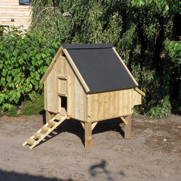 A wooden UK made chicken coop on long legs